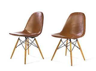 Charles and Ray Eames (American, 1907-1978; 1912-1988), HERMAN MILLER, CIRCA 1951, a pair of tan DKW chairs