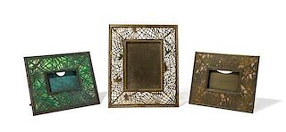 Tiffany Studios, a set of three frames comprising Grapevine and Pine Needle calendar frames and a Pine Needle picture frame