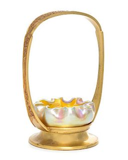 * Tiffany Studios, a basket of handled form set with a glass salt dish