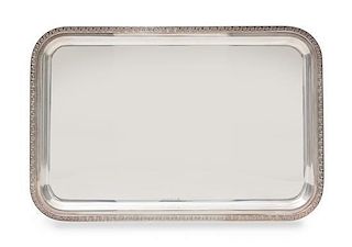 An Italian Silver Serving Tray, Antonio Braganti, Faberge, Florence, Italy, decorated with a Greek Key border