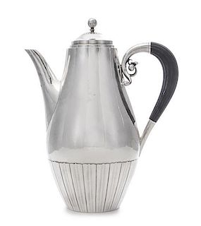 * Johan Rohde (Danish 1856-1935), GEORG JENSEN A/S, COPENHAGEN, a Cosmos pattern silver coffee pot, design number 45A