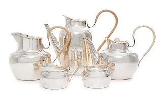 A Silver Five-Piece Tea and Coffee Service, Erik Herlow, A. Michelsen, Copenhagen, Denmark, comprising a coffee pot, teapot, 