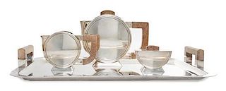 A French Art Deco Silverplate Tea Service, Christofle after a design by Christian Fjerdingstad, Paris, France, comprising a t