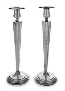 A Pair of American Arts and Crafts Silver Candlesticks, Marshall Field & Co., Chicago, IL, each having a baluster form candle