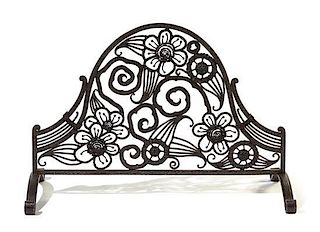 An Art Deco Wrought Iron Arched Firescreen, FRANCE, EARLY 20TH CENTURY, with floral scoll decoration