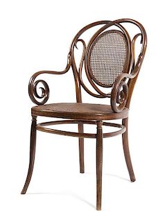 Thonet, AUSTRIA, EARLY 20TH CENTURY, a bentwood fauteuil, having an oval caned splat within scrolled supports over conforming