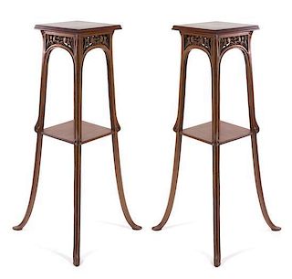 * Louis Majorelle (French, 1859-1926), EARLY 20TH CENTURY, a pair of walnut plant stands