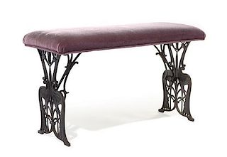 An Art Nouveau Cast Metal Bench, FRANCE, EARLY 20TH CENTURY, the padded seat raised on crane-form supports