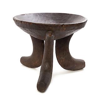 An African Carved Wood Tripod Stool Height 14 inches