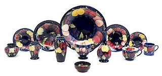 * A Collection of Moorcroft Wisteria Patterned Table Articles Diameter of largest 10 3/4 inches