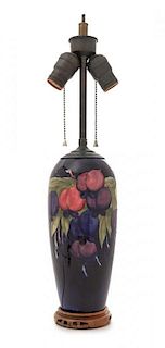 * Moorcroft, ENGLAND, FIRST HALF 20TH CENTURY, a Wisteria pattern vase, mounted as a lamp