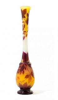 Emile Galle (French, 1846-1904), , a cameo glass vase, having a long neck, decorated with flowers throughout