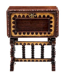 A Spanish Style Mahogany and Fruitwood Vargueno Height 3 7/8 x width 3 1/4 x depth 1 3/4 inches.