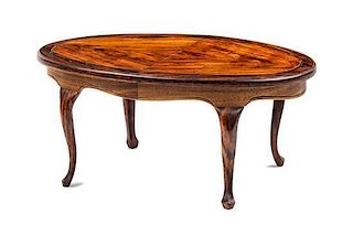 A Queen Anne Style Rosewood Dining Table Height 2 3/8 x width 5 3/8 x depth 3 1/4 inches.
