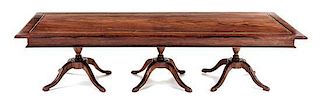 A George III Style Triple Pedestal Dining Table Height 2 1/2 x width 10 1/2 x depth 4 inches.