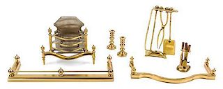 A Group of Brass Fireplace Articles Width of widest fender 4 5/8 inches.