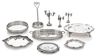 A Collection of English Silver Serving Trays, Various Makers, comprising a two-handled tray with a pierced gallery and center