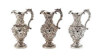 Three Jewel-Inset Silver Ewers, Harry Smith, Perrysville, IN, each having a serpentine handle.