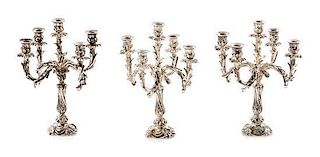 Three Silver Five-Light Candelabra, Harry Smith, Perrysville, IN, each having a baluster form standard issuing foliate candle