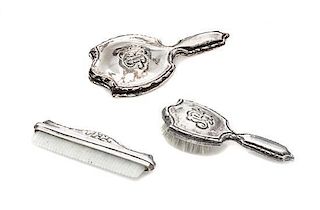 Three American Silver Dresser Articles, Obadiah Fisher, New York, NY, comprising a hand mirror, a brush and a comb.