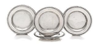 A Set of Four American Silver Dinner Plates, Obadiah Fisher, New York, NY, each having a gadrooned border.