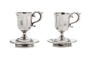 A Pair of American Silver Cups and Saucers, Obadiah Fisher, New York, NY, each having a C-scroll handle and a baluster form b
