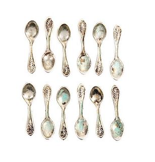 A Set of Twelve American Silver Teaspoons, Attributed to Obadiah Fisher, New York, NY, each having Old English handles with b