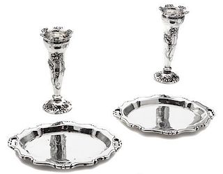 A Group of Four American Silver Table Articles, Starr, comprising a pair of vases and two oval serving trays.