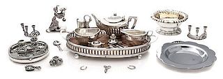 A Collection of Silver and Silver-Plate Articles, Various Makers, comprising a ten-piece dresser set; a three-piece tea servi