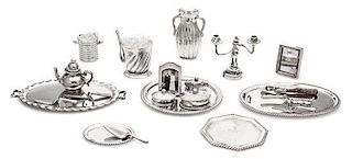 A Collection of Silver Table Articles, Enrique Quintanar, comprising five serving trays, three table caskets, a lobed water p