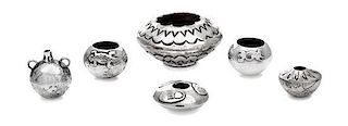 A Group of Five Native American Silver Vessels, , comprising a pair of bowls with applied lizard decoration, a fan-decorated 