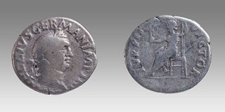 VITELLIUS. 69 AD. AR Denarius (19mm, 2.98 gm). Laureate head right / Jupiter