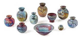 Ten Iridescent Pottery Articles Height of tallest 1 1/4 inches.
