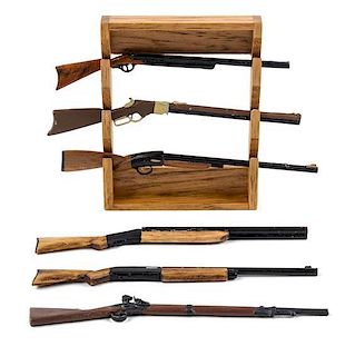A Collection of Rifles and Shotguns Length of longest 3 5/8 inches.