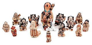 A Group of Fourteen Pottery Figures Height of first 3 3/8 inches.