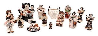 Fourteen Acoma Pottery Figures Height of tallest 1 7/8 inches.