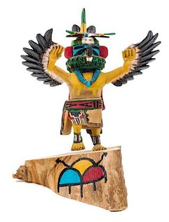 A Carved and Painted Wood Kachina Figure Height 5 3/4 inches.