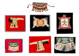 Seven Native American Style Garments Width of widest 5 1/8 inches.