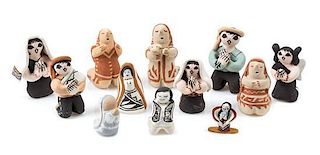 A Group of Native American Pottery Figures Height of tallest 2 1/4 inches.