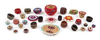 A Group of Native American Beaded Baskets Width of widest 2 inches.