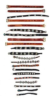 A Collection of Native American Leather Belts Length of longest 5 1/2 inches.