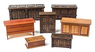 A Group of Seven Chests Width of widest 5 3/4 inches.