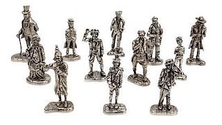 A Collection of Twelve English Pewter Figures Height of tallest 2 3/4 inches.