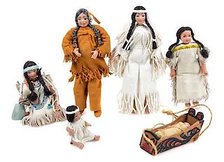 Six Native American Bisque Porcelain Dolls Height of tallest 5 1/4 inches.