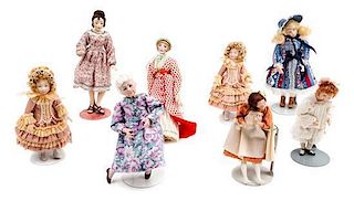 A Group of Eight Bisque Porcelain Dolls Height of tallest 5 5/8 inches.