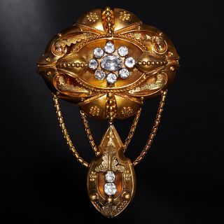 ANTIQUE VICTORIAN MEMORIAL BROOCH. set with white stones , decorated with floral leaf design and beaded decorations . with a suspended drop. highly de