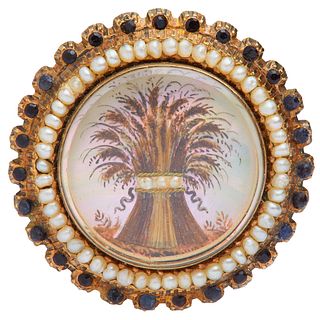 GEORGIAN MOTHER OF PEARL SHEAF OF WHEAT BROOCH, of round design. The centre decorated with a sheaf of wheat, on a mother of pearl background. The surm