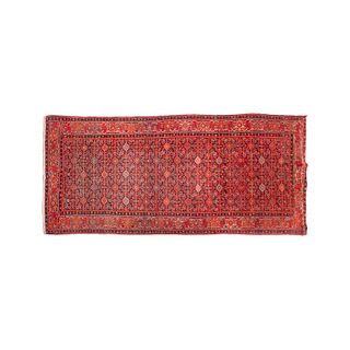 TAPETE IRÁN, SIGLO XX Estilo BOKHARA Anudado a mano en fibras de lana y algodón Decoraciones geométricas en tonos rojo.