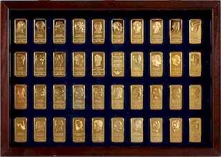 PROOF 65-70 GRADE 24 KT GOLD ON 1-OUNCE BRONZE BARS