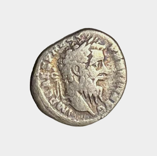 Pertinax. AD 193. Silver Denarius (18mm, 2.94g, 12h). Rome mint. 2nd emission. Laureate head right / Pertinax standing left, holding volumen and sacri